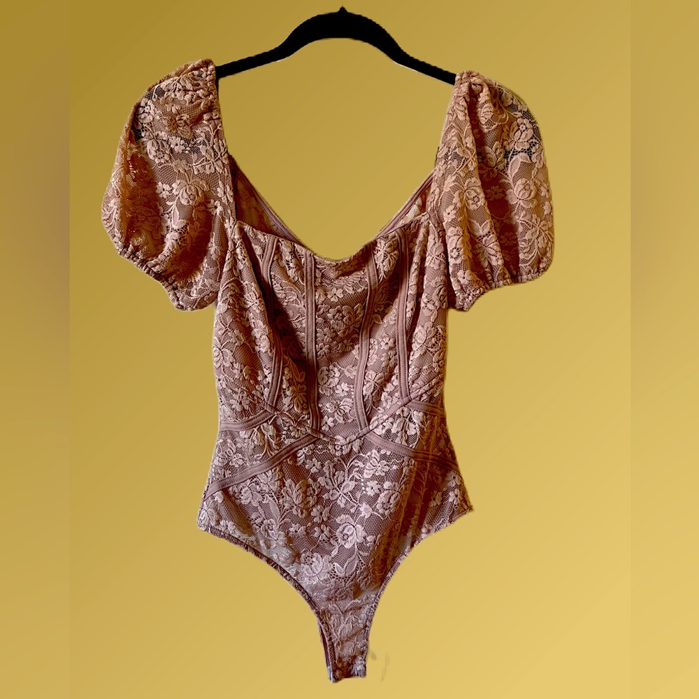Sexy, cap sleeve bodice style rose color bodysuit by Forever 21.  Size small